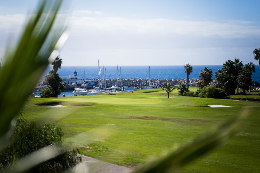Golf course overlooking the marina at Amarilla Golf in Tenerife