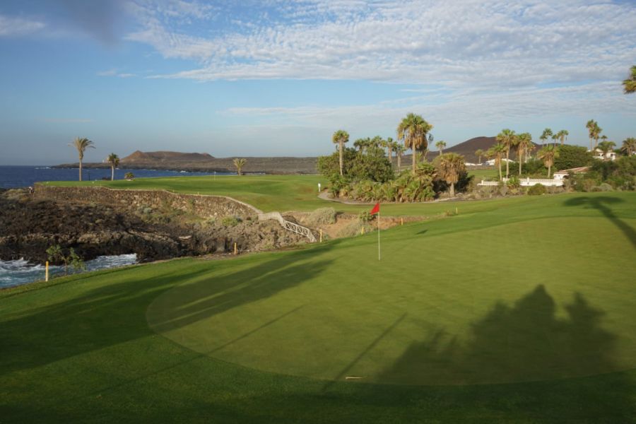 Red flag on the putting green at Amarilla Golf in Spain