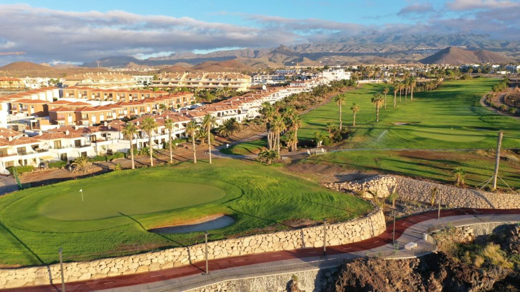 Villas and apartments lining one side of Amarilla Golf in Tenerife