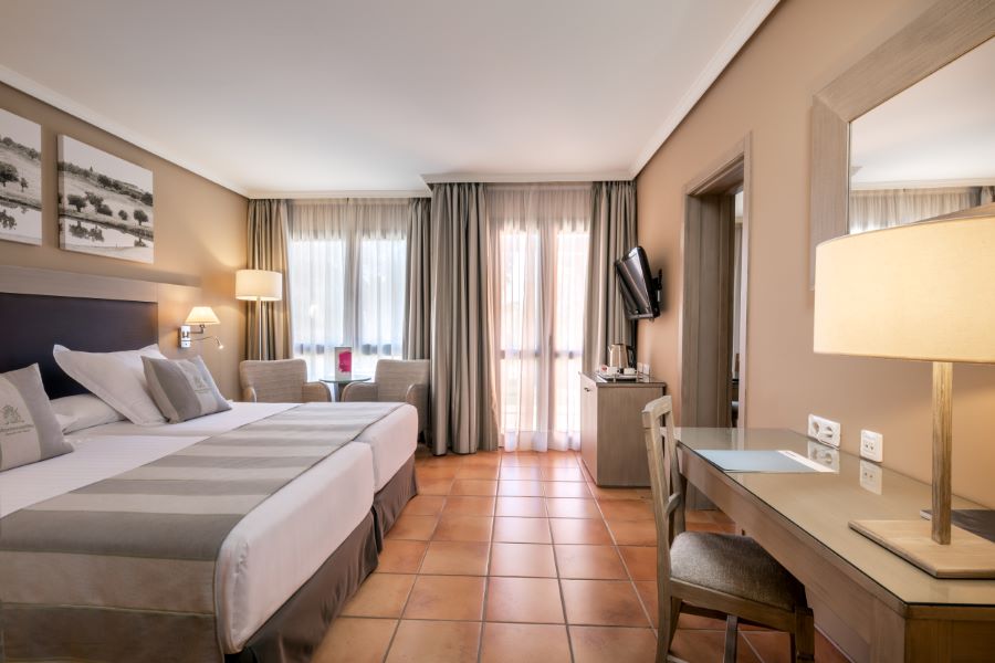 Twin beds in the room at Barcelo Montecastillo Golf Resort