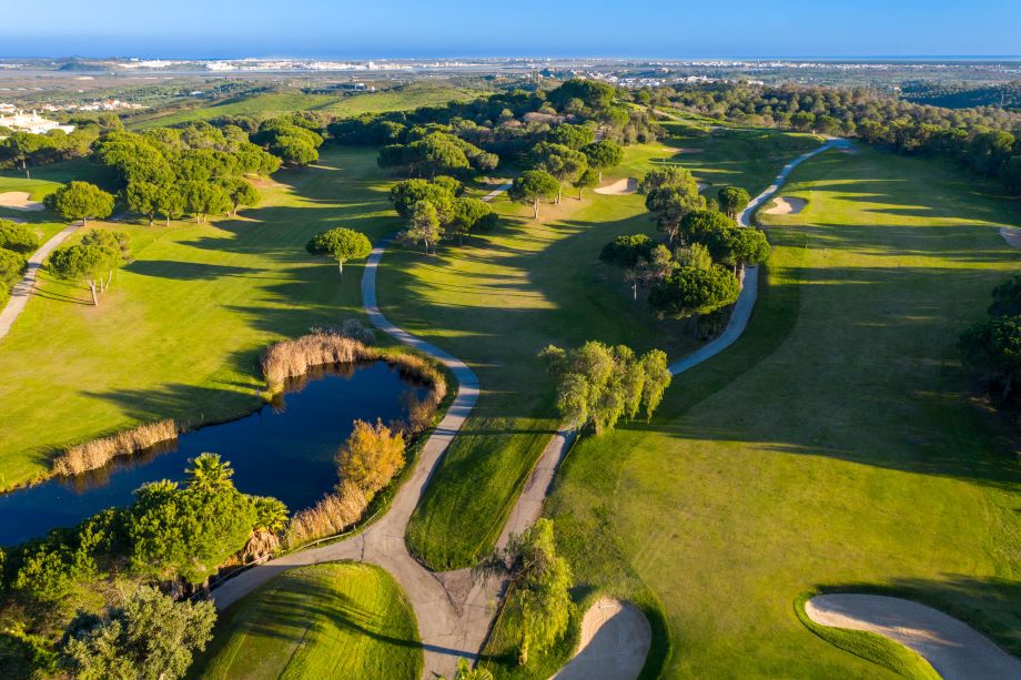 Lake to one side of the fairway at Castro Marim Golf Course