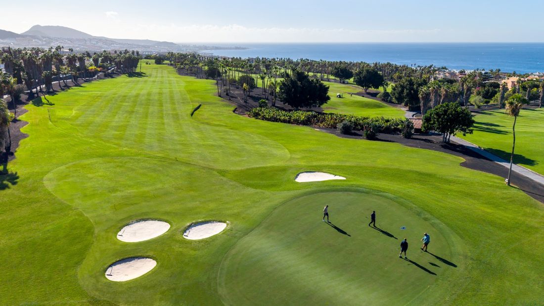 White sand bunkers on Costa Adeje golf course with blue sky overhead