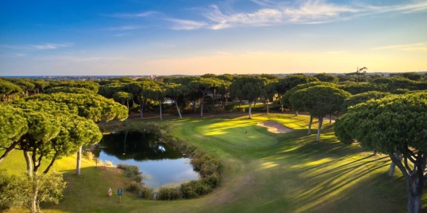 Dom Pedro Golf Millennium Course in Vilamoura with lake to the left