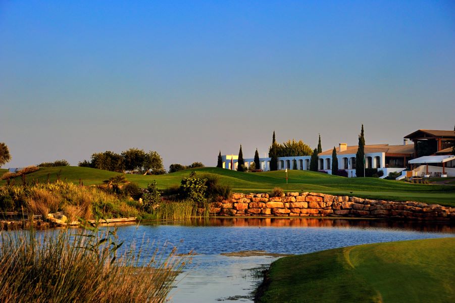 Lake and clubhouse at Dom Pedro Victoria Golf Course in Vilamoura