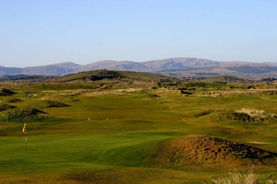 Blue sky over lush green fairway at Donegal Golf Club in Ireland