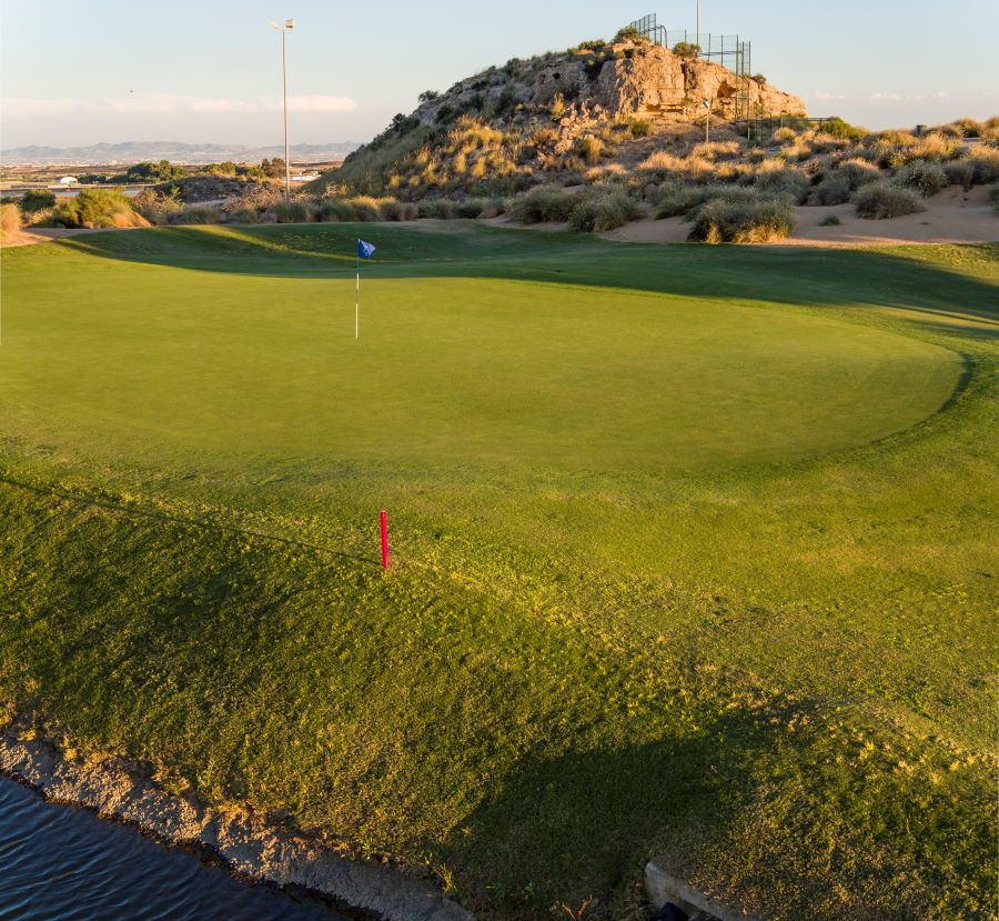 Hill in the distance of the putting green at El Valle Golf Resort, Murcia, Spain