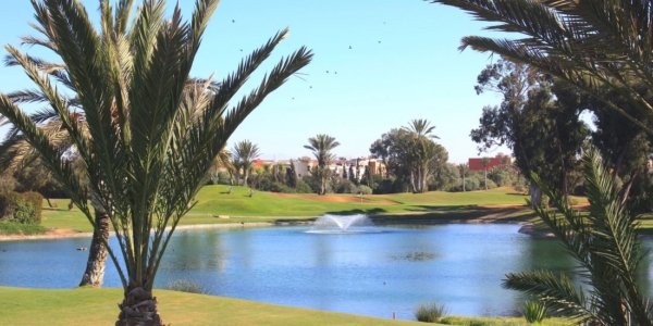 Club house in the distance of Golf Le Soleil