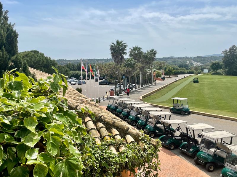 Clubhouse with buggies lined up outside at La Canada Golf
