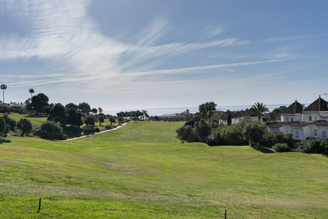 Blue sky and clouds overhead at La Duquesa Golf Club in Spain