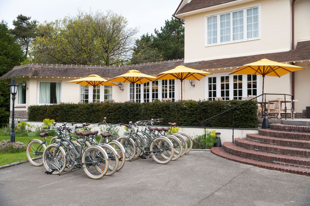 Bicycles parked outside the entrance of Le Manoir Hotel Le Touquet