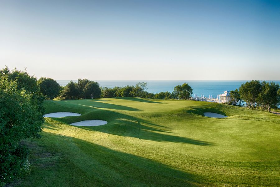 Lush green fairways overlooking the sea at Lighthouse golf course