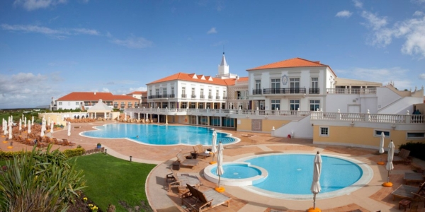 Rear of Marriott Praia DEl Rey Resort with swimming pools surrounded by sun loungers