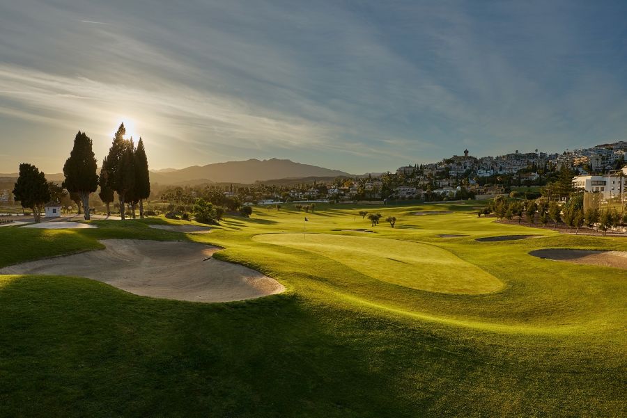 Bunker to the left of the putting green on the course at Mijas Golf Club