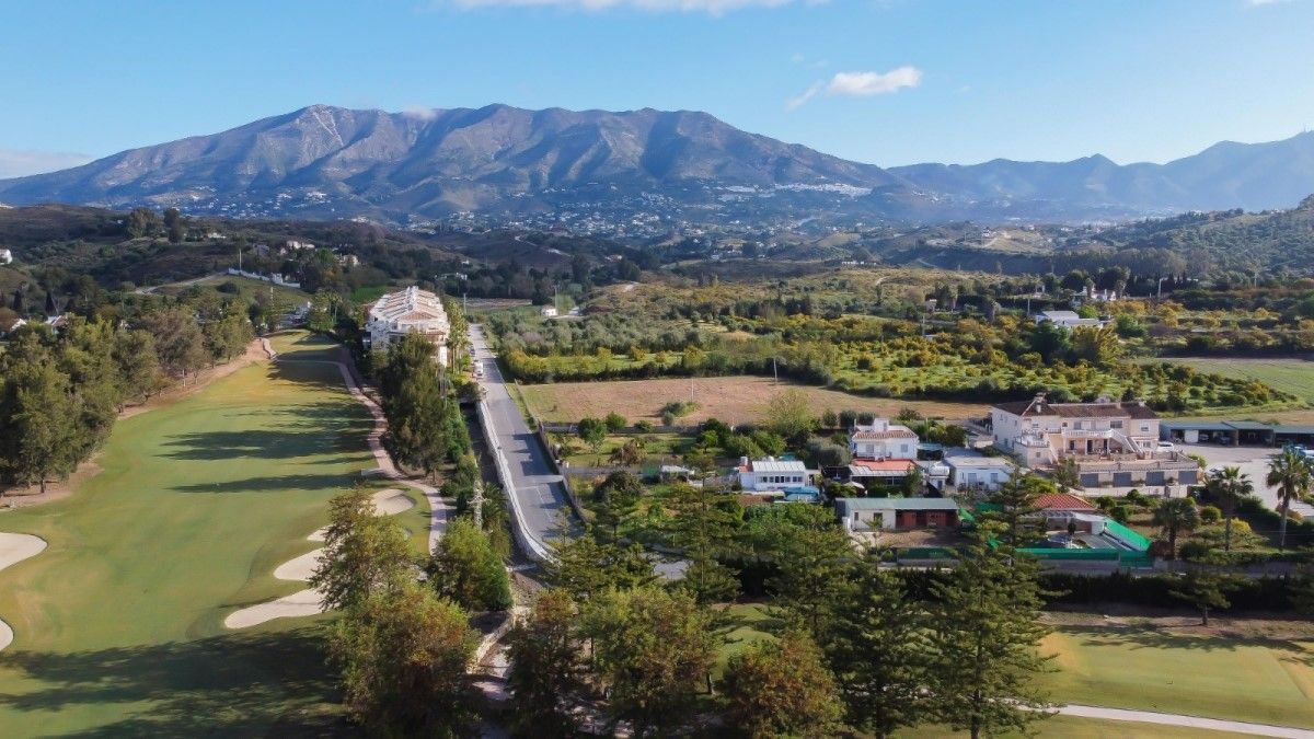 Road running between the golf courses at Mijas in Spain