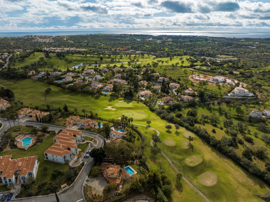 Villas and apartments on either side of fairway at Pestana Gramacho golf couse