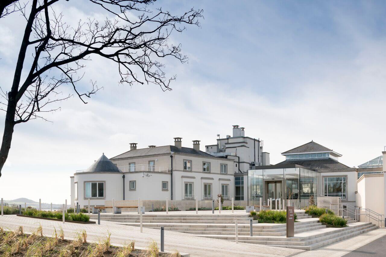 Exterior of Portmarnock Hotel and Golf Links with entrance