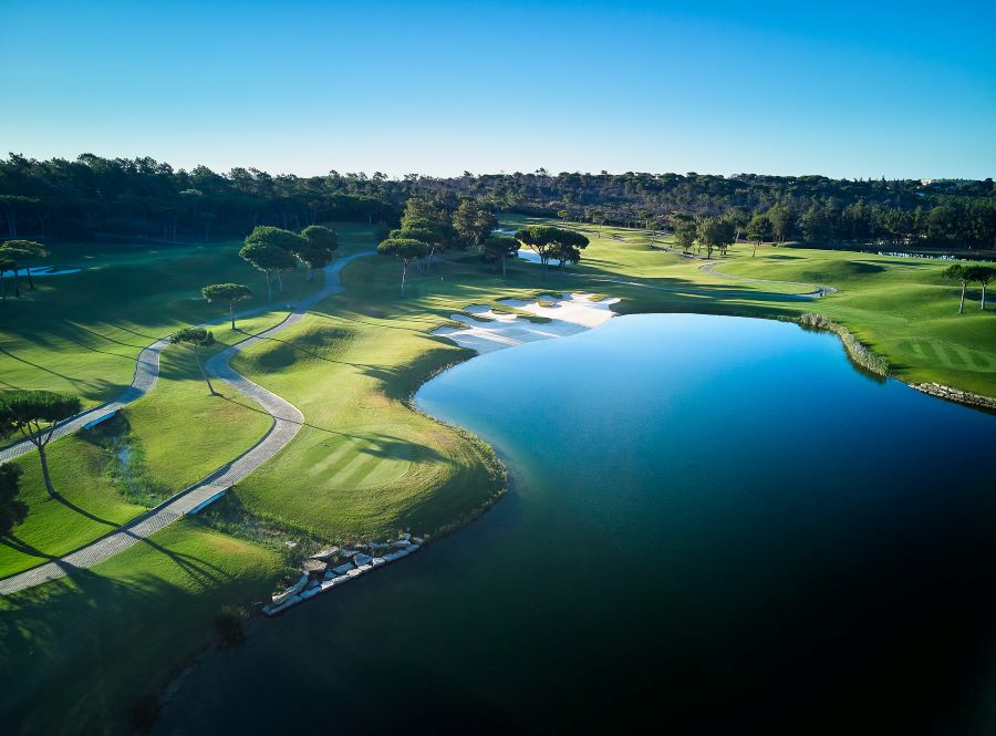 Lake to the right of the fairway at Laranjal Golf Course in the Algarve