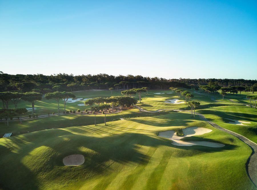 Blue sky over the trees and Laranjal golf course at Quinta Do Lago