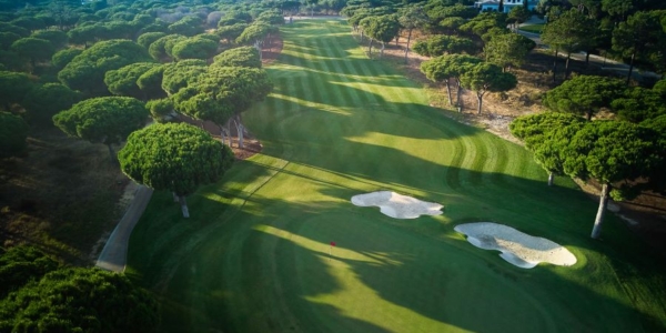 Quinta Do Lago's North Course looking down the fairway with trees lining it