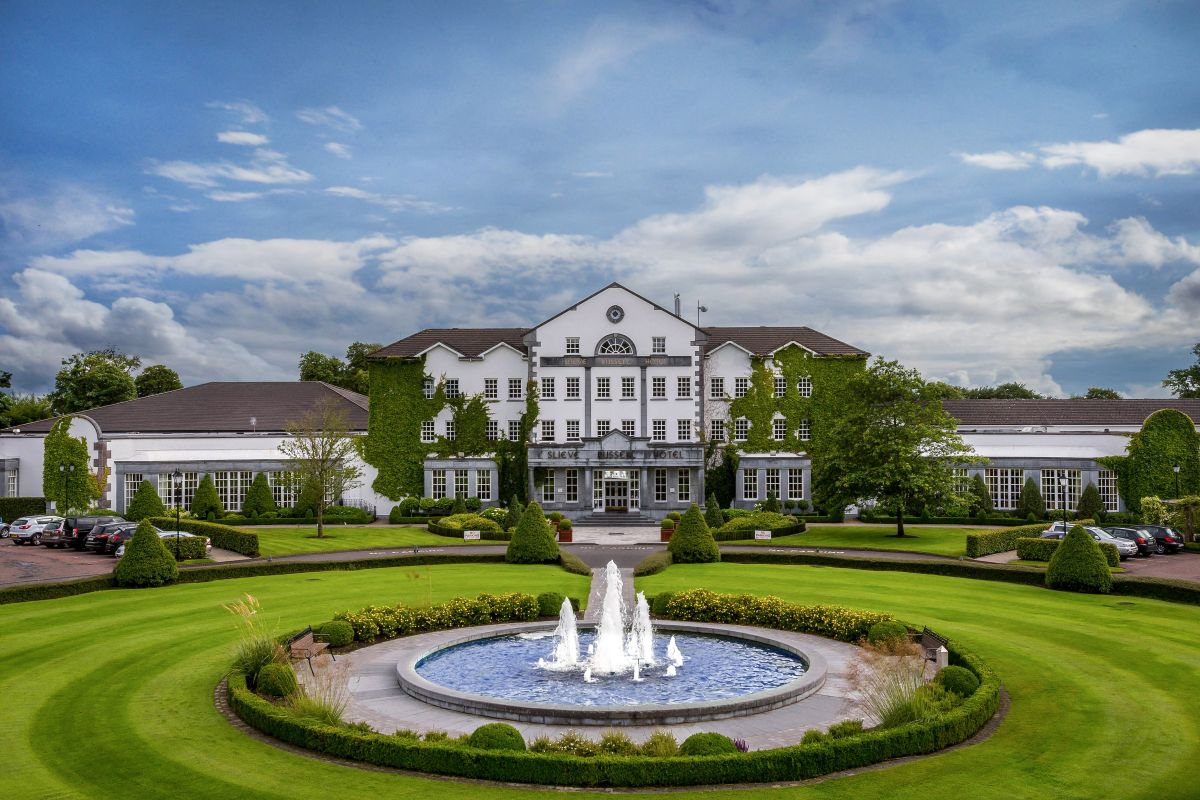 Amazing clubhouse with water feature in front at Slieve Russell Golf & Country Club
