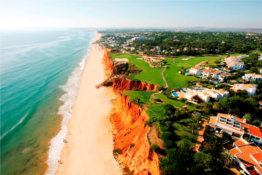 Sea, sand and cliff tops with the Vale Do Lobo Royal course perched on top