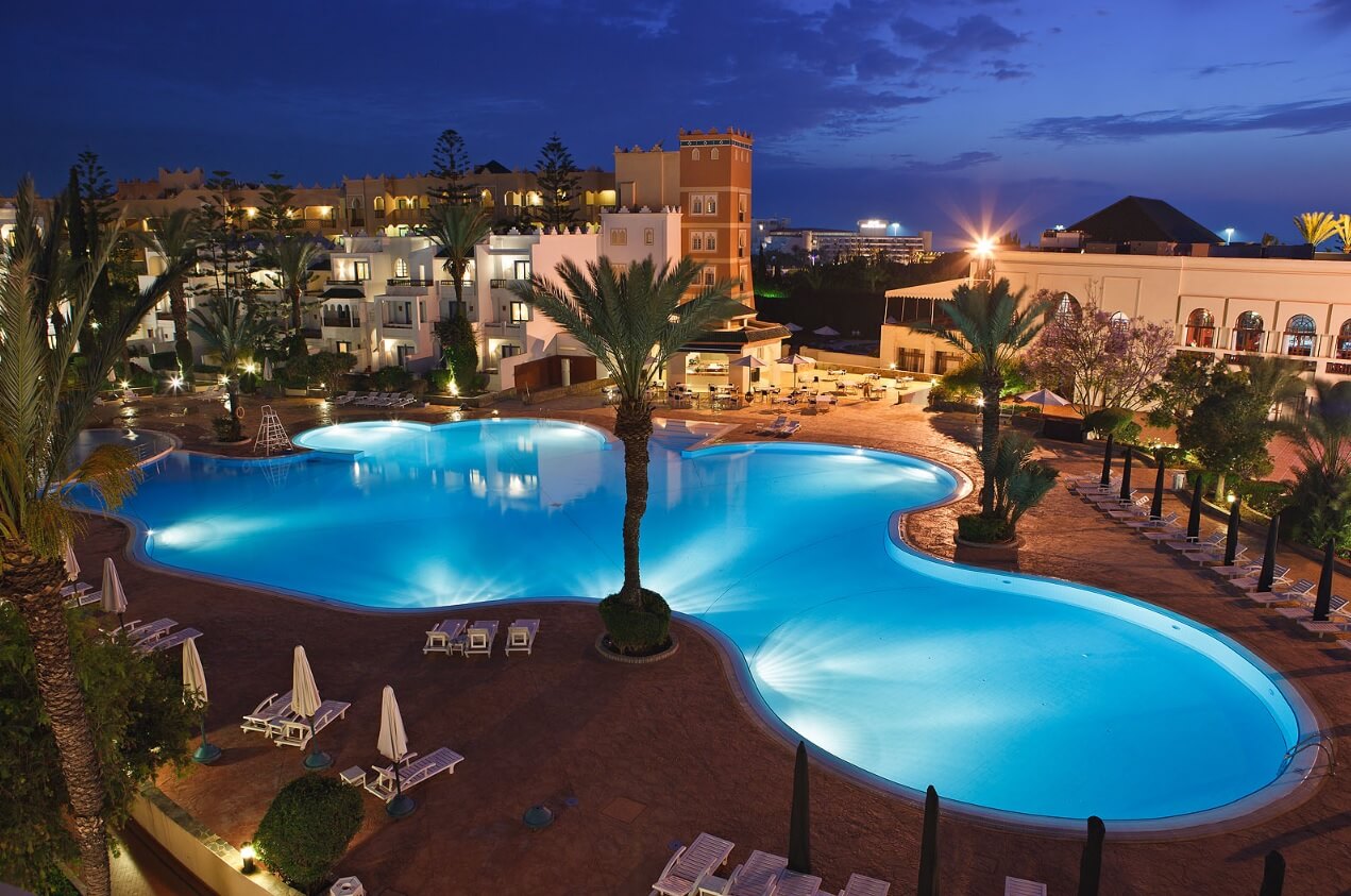 Outdoor swimming pool at Atlantic Palace Hotel in Agadir at night time