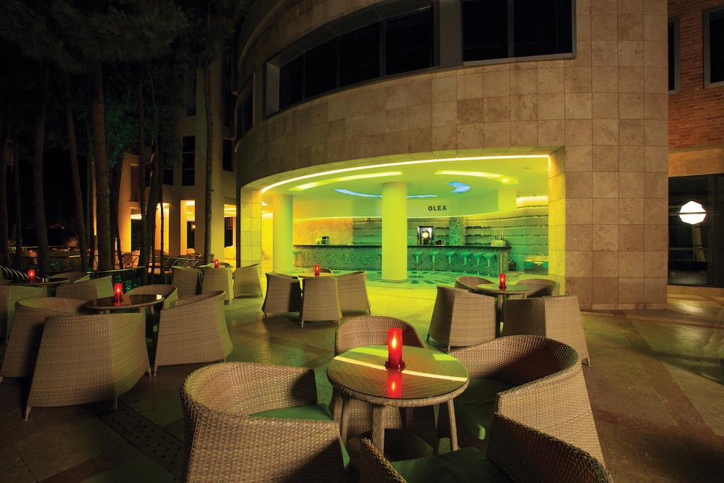 Illuminated bar with outdoor seating at Cornelia Deluxe Resort