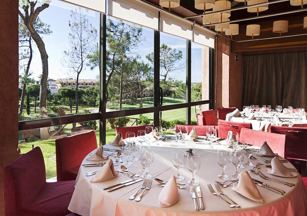Restaurant overlooking the golf course at DoubleTree by Hilton Islantilla Beach Golf Resort
