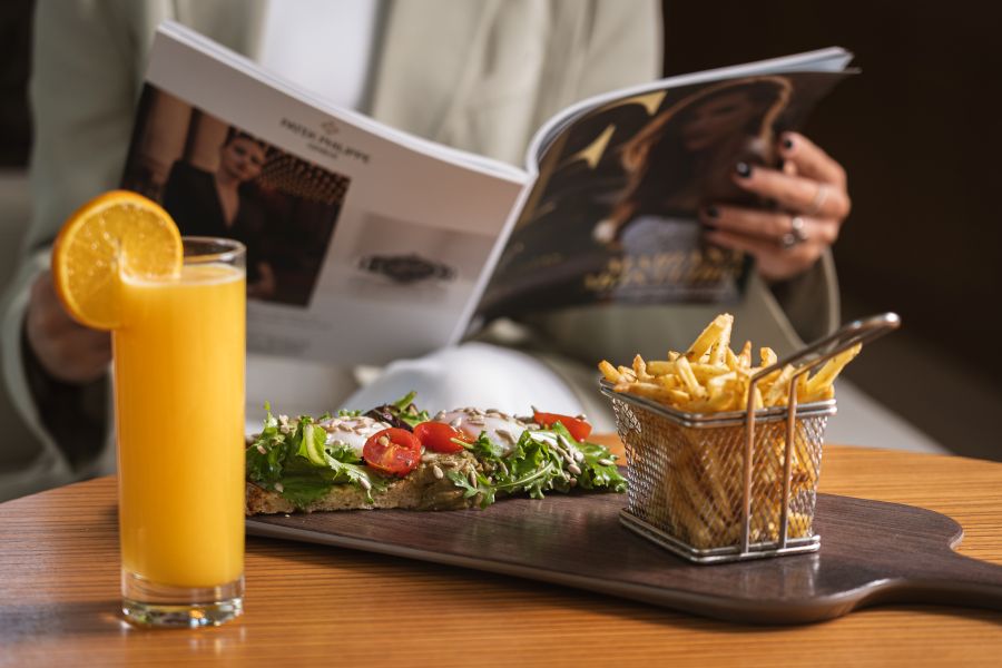 Chips and fresh orange with open sandwich at Sheraton Cascais Hotel