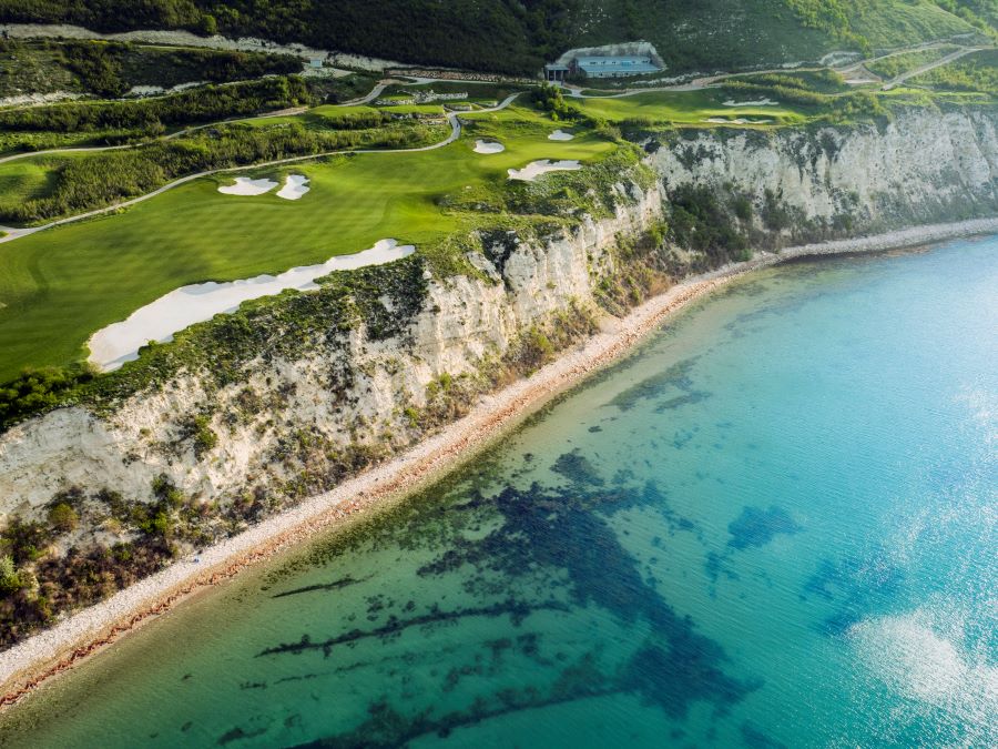 Stunning view of the sea and golf course with bunkers on top of the cliffs at Thracian Cliffs Golf Course