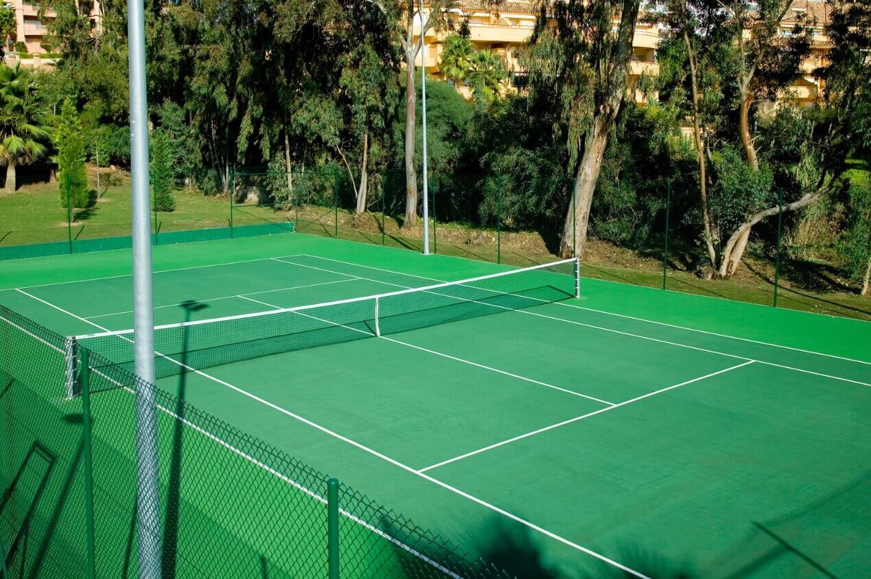 Floodlit tennis courts at Rio Real Golf Hotel