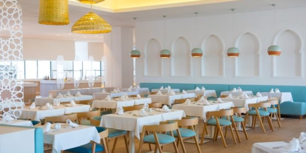 Dining room at Iberostar Founty Beach Hotel Agadir with tables set for guests