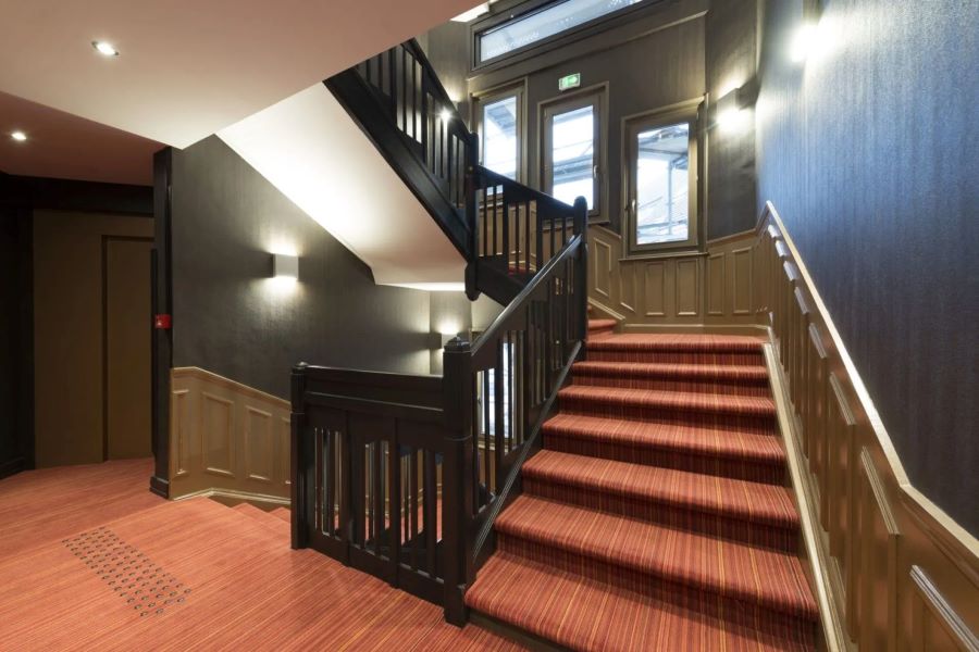 Stairs with red carpet at Hotel Bristol Le Touquet