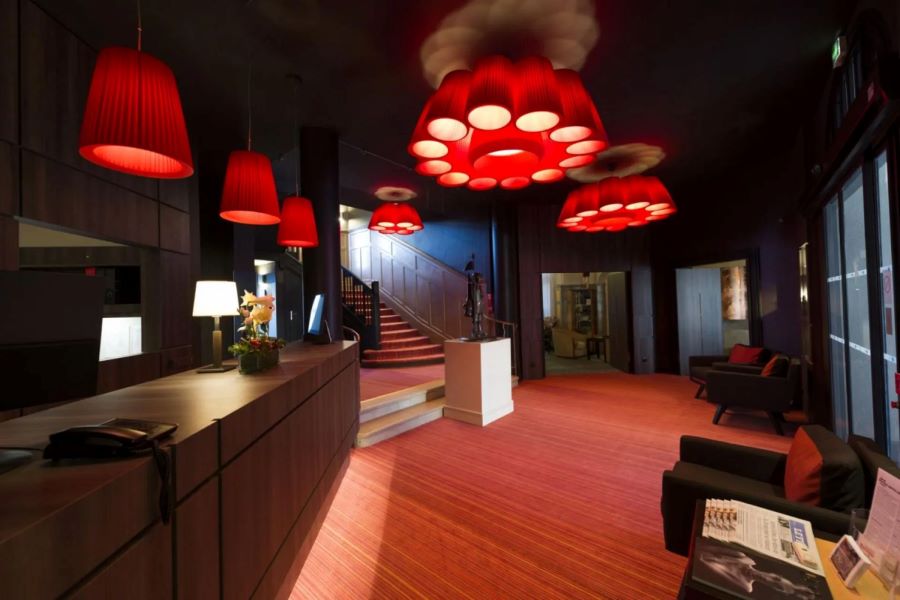 Reception with red carpet and red lighting at Hotel Bristol Le Touquet in France