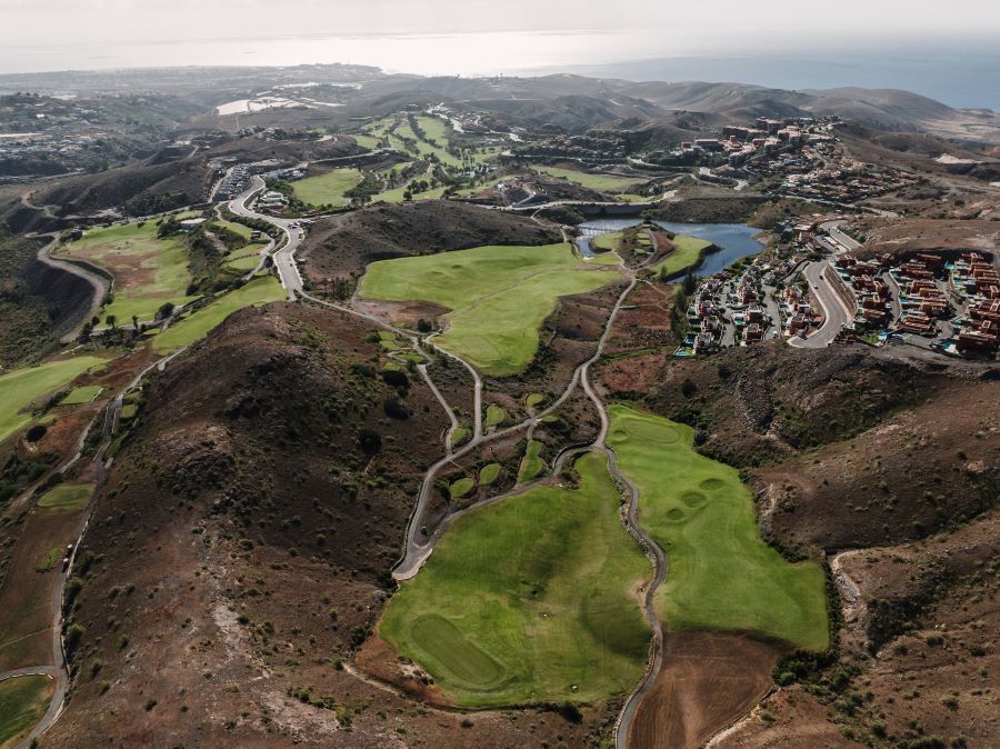 Arial shot of Salobre Golf with resort and hotel to the right