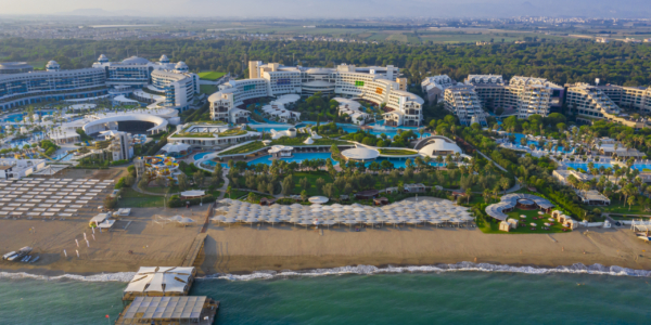 Cornelia Diamond Resort with beach and sea in the foreground