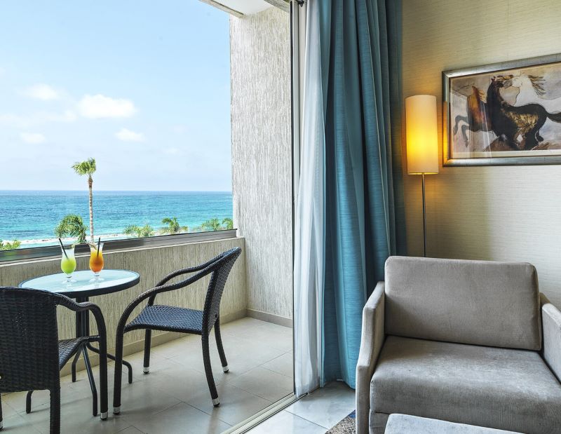 Balcony view of the sea at room with view at Alexander The Great Beach Hotel
