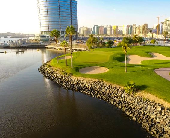 Dubai Creek Golf Club with water to the left
