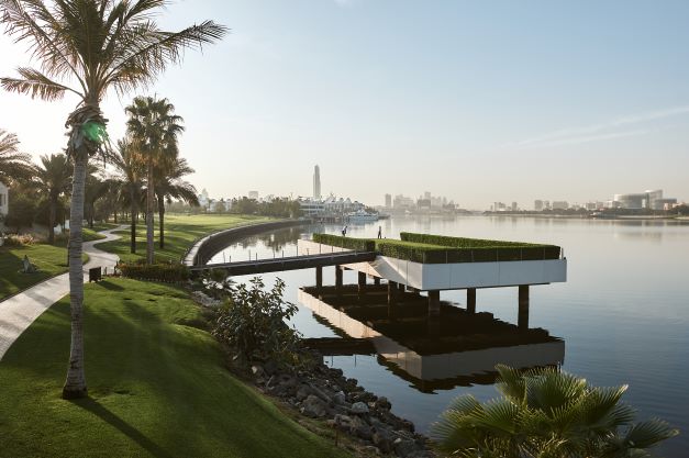 Dubai Creek Golf Club with palm trees