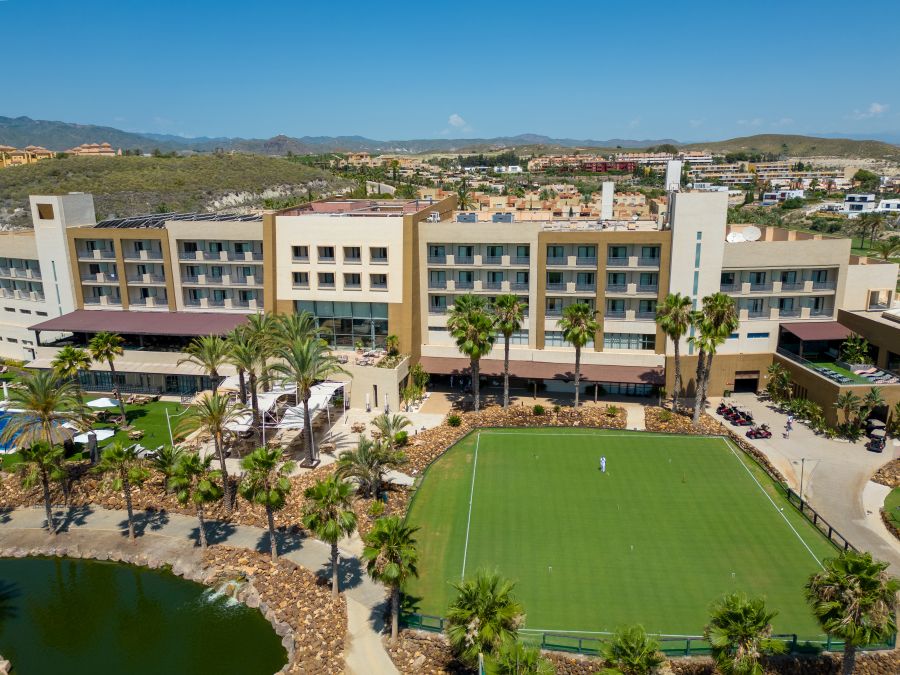 Valle Del Este Golf Resort with sports facilities in front of the resort