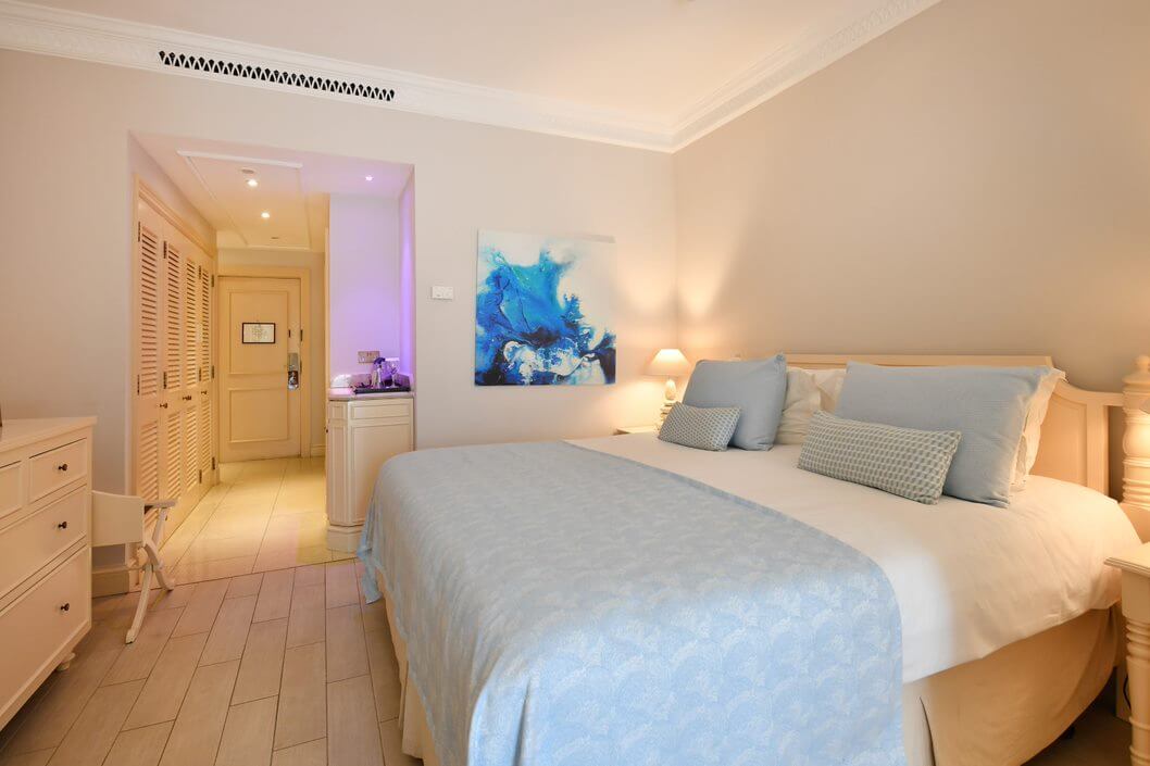 Double bedroom at Aphrodite Hills Resort with tiled floor