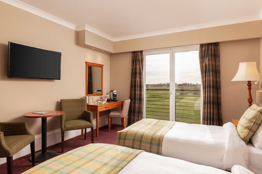 Carnoustie Golf Hotel & Spa with twin beds and tv on the wall