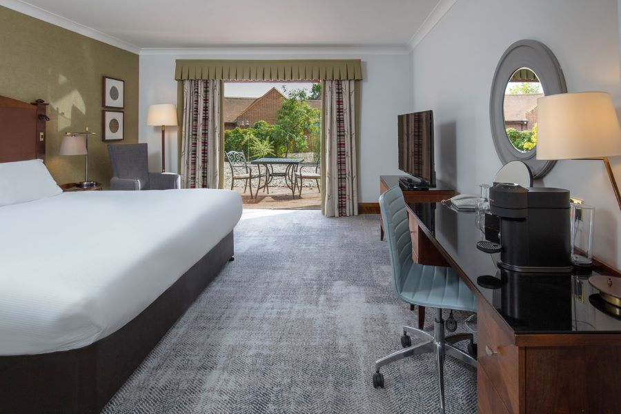 Double room with desk and chair at Dunston Hall Golf And Spa Hotel