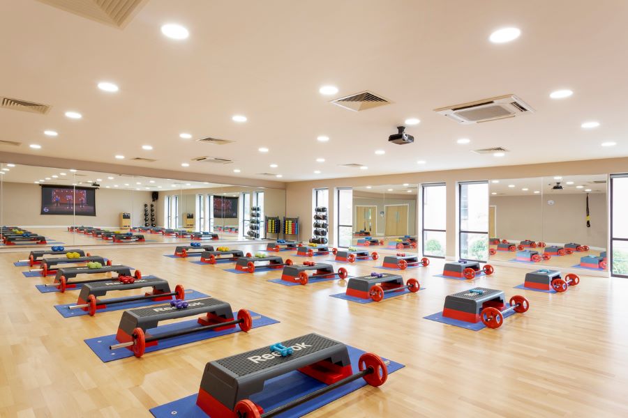 Studio with steps and weights ready for class at Forest Pines Hotel, Spa And Golf Resort