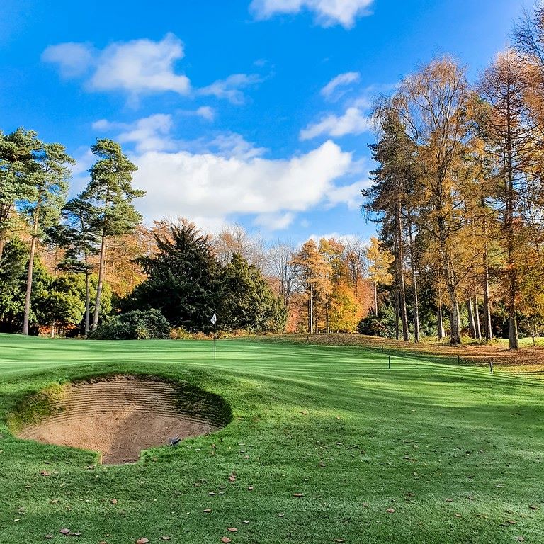 Blue sky and white clouds over the course on an autumn day at Forest Pines Hotel, Spa And Golf Resort