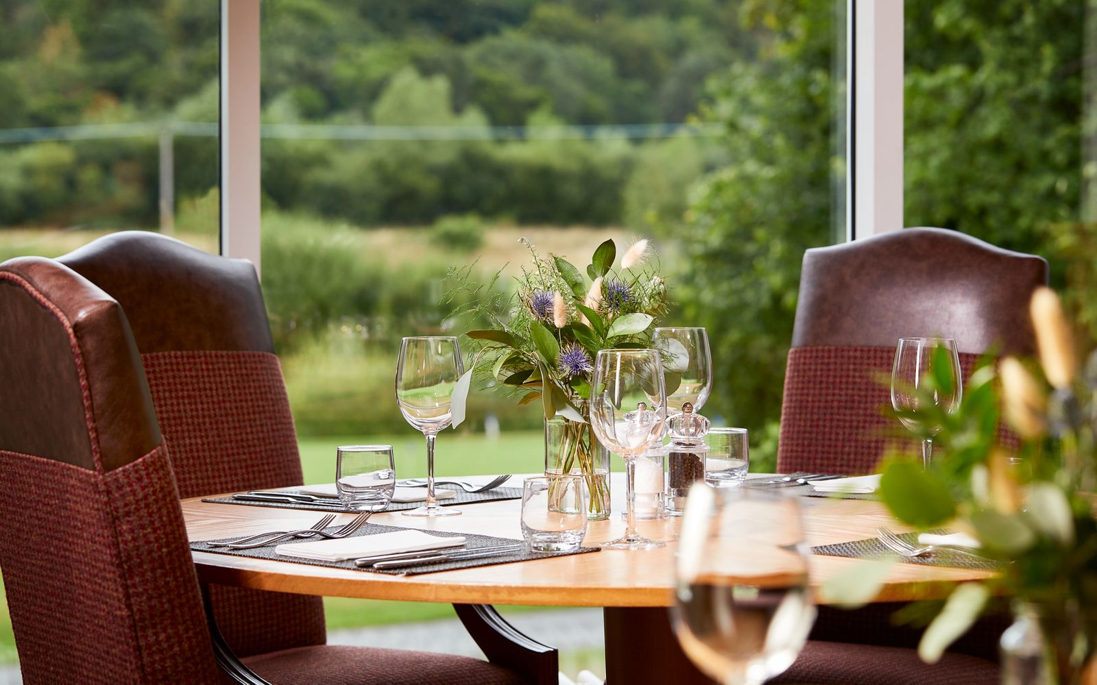 Restaurant with view to the golf course at Macdonald Cardrona Hotel
