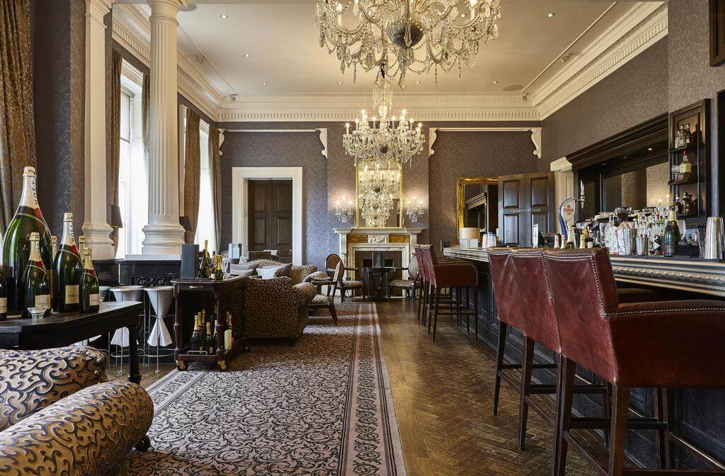 Luxurious bar and seating area at Oulton Hall Golf Hotel And Spa