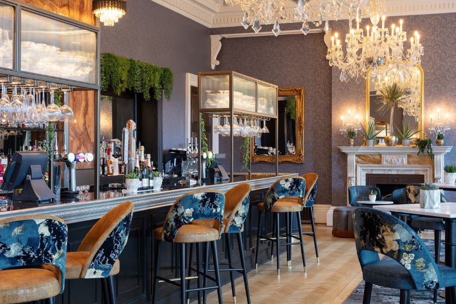 Bar with stools at Oulton Hall Golf Hotel And Spa