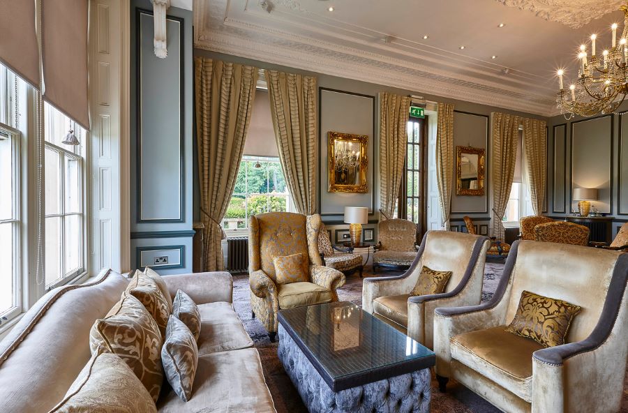 Lounge area with golf chairs at Oulton Hall Golf Hotel And Spa
