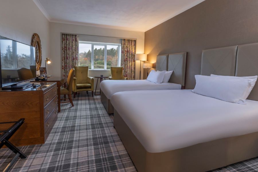 Tartan carpet in twin bedded superior room at Slaley Hall Hotel, Spa And Golf Resort